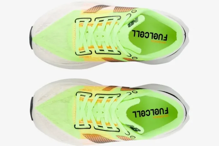 Top-down view of New Balance FuelCell Rebel v4 running shoes in white and lime green. - SKU MFCXLL4