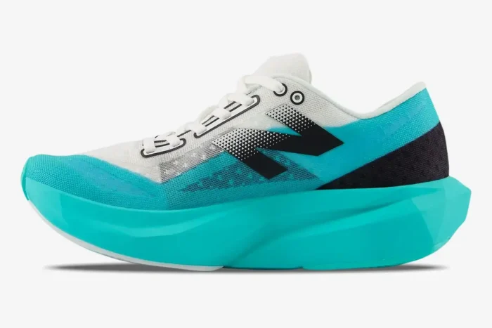 Side view of New Balance Fuelcell Supercomp Elite V4 running shoe in white and Cyber Jade with black accents. - SKU MRCELCG4