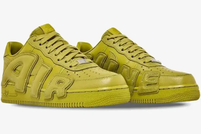 A pair of moss green Nike Air Force 1 Low x CPFM sneakers shown from a three-quarter perspective. - SKU FQ7069-300