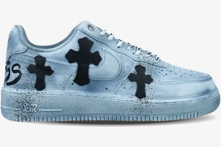 nike-air-force-1-chrome-hearts-custom-side Side profile of a custom Nike Air Force 1 in metallic silver with black Chrome Hearts cross patches.
