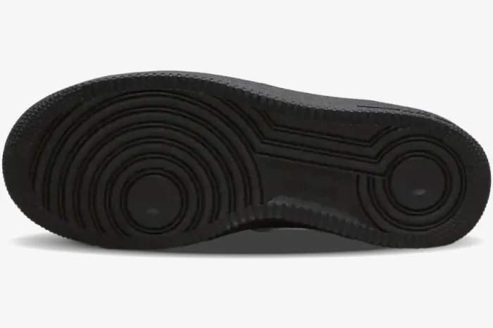 Black rubber outsole of Nike Air Force 1 Low x Ambush sneakers featuring the AMBUSH logo. - SKU DV3464-001