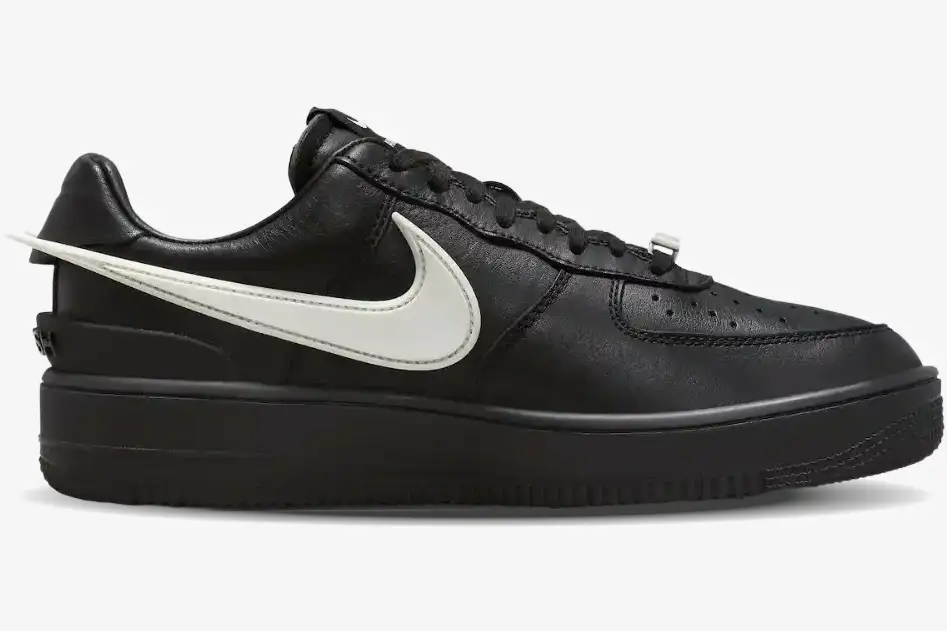 nike-air-force-1-low-ambush-black-white-side-dv3464-001-img718 Nike Air Force 1 Low x Ambush in black leather with an oversized white Swoosh, side profile view. - SKU DV3464-001
