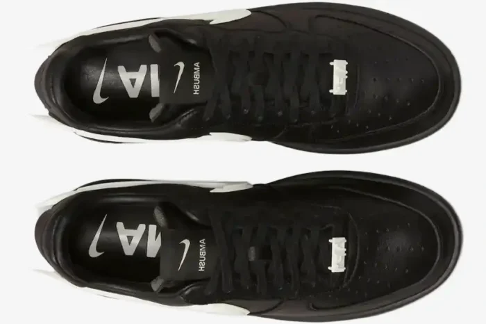 Top-down view of black Nike Air Force 1 Low x Ambush sneakers with white oversized Swooshes and lace dubraes. - SKU DV3464-001