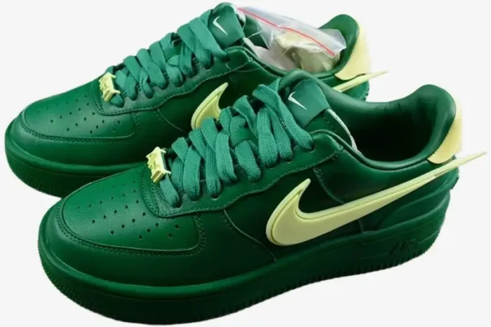 Nike Air Force 1 Low x Ambush sneakers in Pine Green and Citron, three-quarter side view on a white background. - SKU DV3464-300