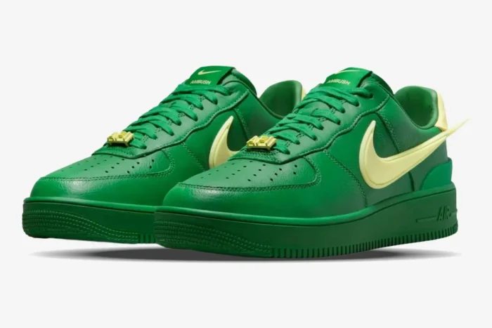 Nike Air Force 1 Low x Ambush Pine Green and Citron sneakers in a three-quarter front view. - SKU DV3464-300