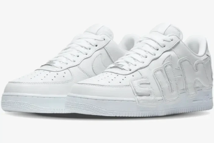 Nike Air Force 1 Low x CPFM White sneakers in a three-quarter side view featuring large SUN bubble letters. - SKU FQ7069100