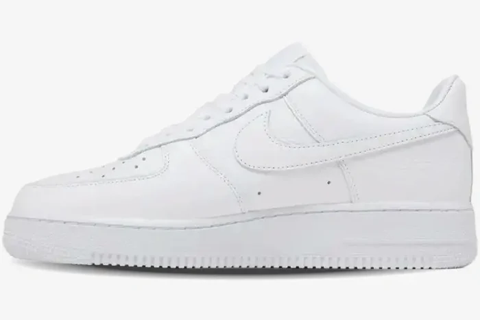 Side view of the all-white Nike Air Force 1 Low x Cactus Plant Flea Market leather sneaker. - SKU FQ7069100