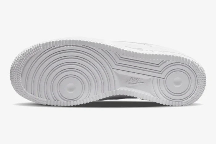 Bottom view of the all-white Nike Air Force 1 Low x NOCTA Certified Lover Boy outsole tread. - SKU CZ8065-100