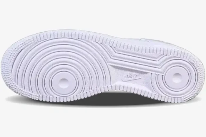 Bottom view of the white Nike Air Force 1 Low x Supreme outsole showing pivot point traction pattern. - SKU SPNK1AF3