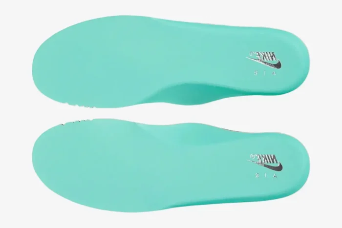 Top-down view of Tiffany Blue insoles for Nike Air Force 1 Low x Tiffany & Co. with silver logos. - SKU DZ1382-001