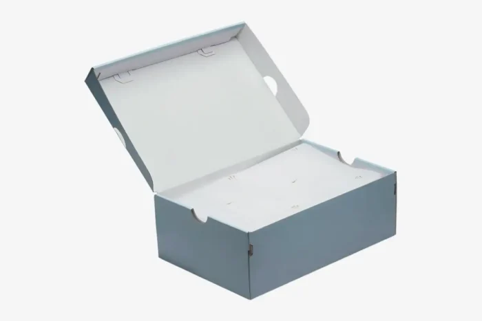 Open light blue Nike Air Force 1 Low x NOCTA shoebox with branded white tissue paper, angled view. - SKU CZ8065-100