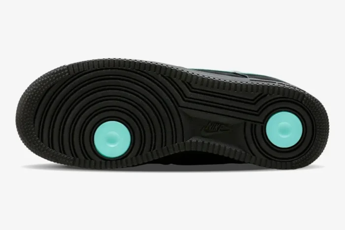 Bottom view of Nike Air Force 1 x Tiffany & Co. black outsole with teal pivot points. - SKU DZ1382-001