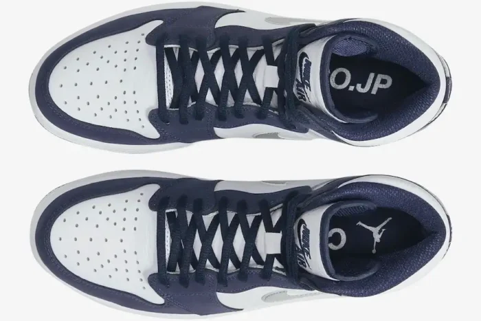 Top-down view of Air Jordan 1 High Midnight Navy CO.JP sneakers with white leather and navy suede overlays. - SKU DC1788-100