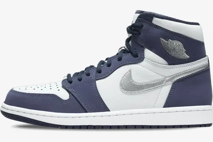 Side profile of Air Jordan 1 High Midnight Navy CO.JP sneakers in navy blue, white, and silver. - SKU DC1788-100