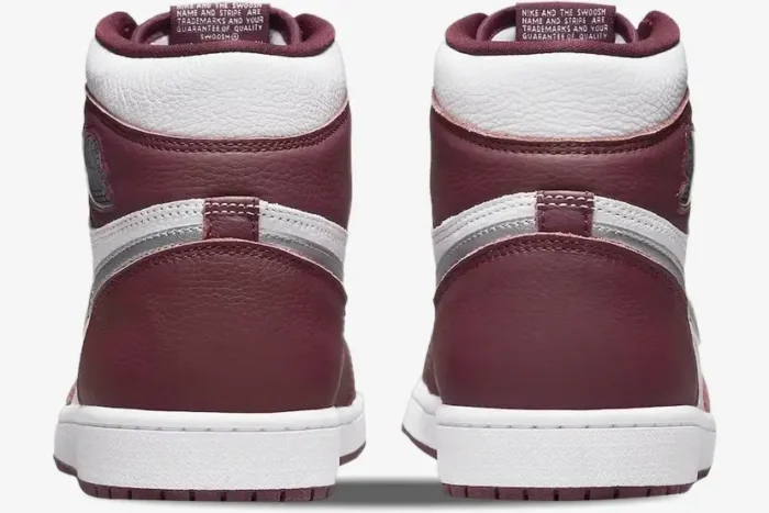 Rear view of Air Jordan 1 High OG Bordeaux sneakers in white and maroon leather. - SKU 555088-611