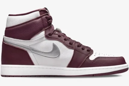 Air Jordan 1 High OG Bordeaux sneaker in a side profile view with white and burgundy leather. - SKU 555088-611
