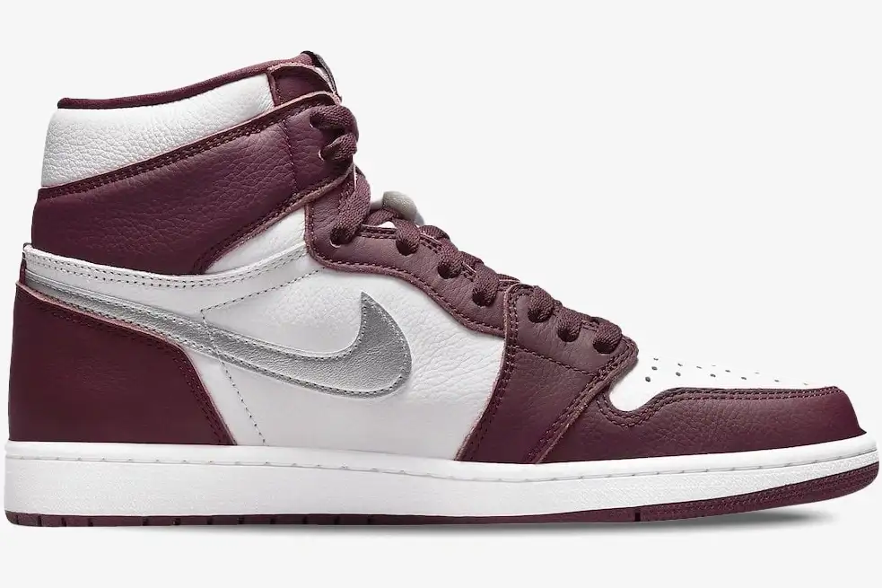 nike-air-jordan-1-high-og-bordeaux-side-view-555088-611-777-215 Air Jordan 1 High OG Bordeaux sneaker in a side profile view with white and burgundy leather. - SKU 555088-611
