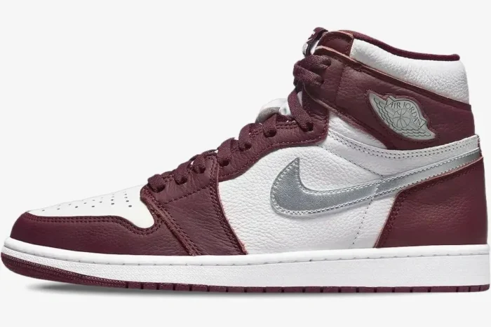 Side profile of Air Jordan 1 High OG Bordeaux sneakers in white and burgundy leather. - SKU 555088-611