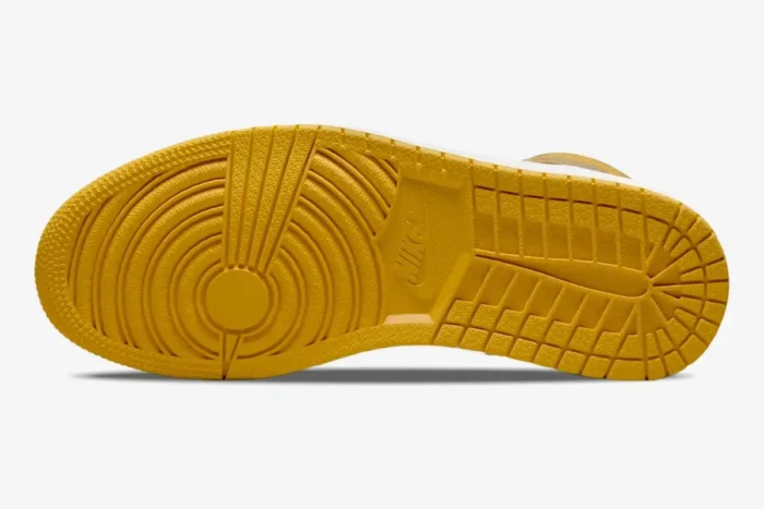 Bottom view of the yellow outsole on an Air Jordan 1 High OG Pollen sneaker.