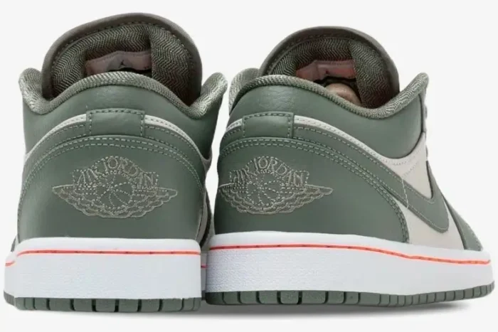 Rear view of Women's Air Jordan 1 Low sneakers in military green with embroidered heel logos. - SKU 553558-121