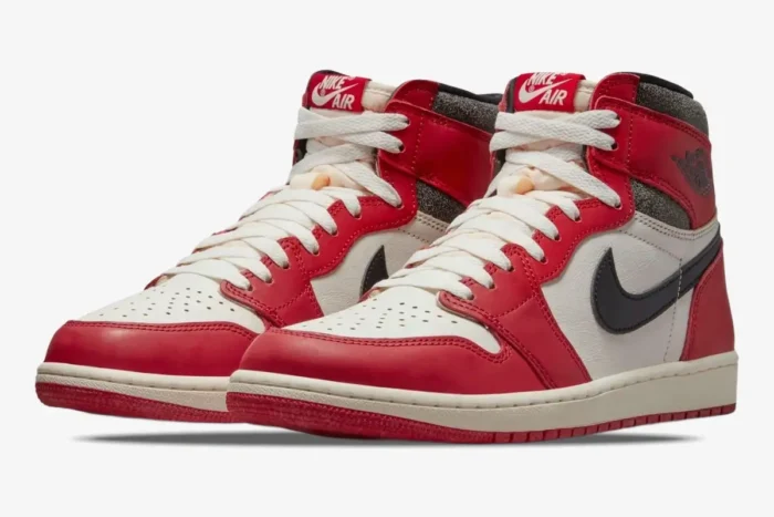Air Jordan 1 Retro High OG Chicago sneakers in red and white, front three-quarter view. - SKU 555088-101