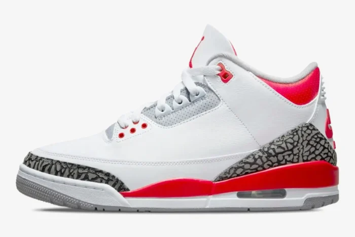 Side profile of the Air Jordan 3 Retro Fire Red OG sneaker in white, red, and elephant print. - SKU DN3707-160