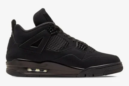 Side profile of the Air Jordan 4 Retro Black Cat in an all-black colorway with a matte suede finish. - SKU CU1110-010