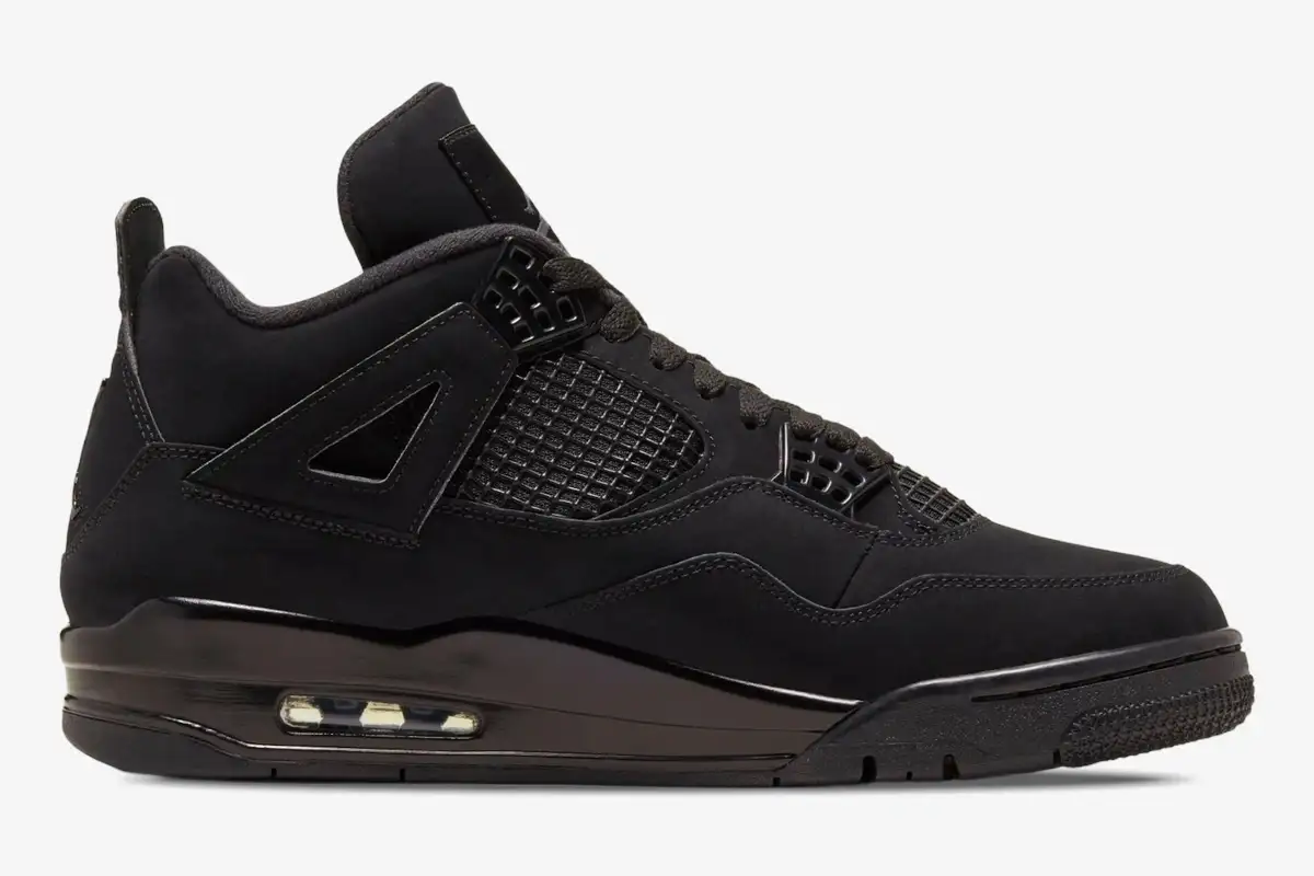 nike-air-jordan-4-retro-black-cat-side-view-cu1110-010-267-661 Side profile of the Air Jordan 4 Retro Black Cat in an all-black colorway with a matte suede finish. - SKU CU1110-010