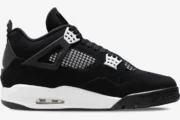 Side profile of an Air Jordan 4 Retro sneaker in black nubuck with white accents and midsole. - SKU FQ8138-001