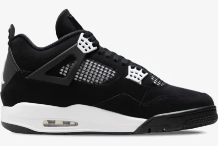 Side profile of an Air Jordan 4 Retro sneaker in black nubuck with white accents and midsole. - SKU FQ8138-001