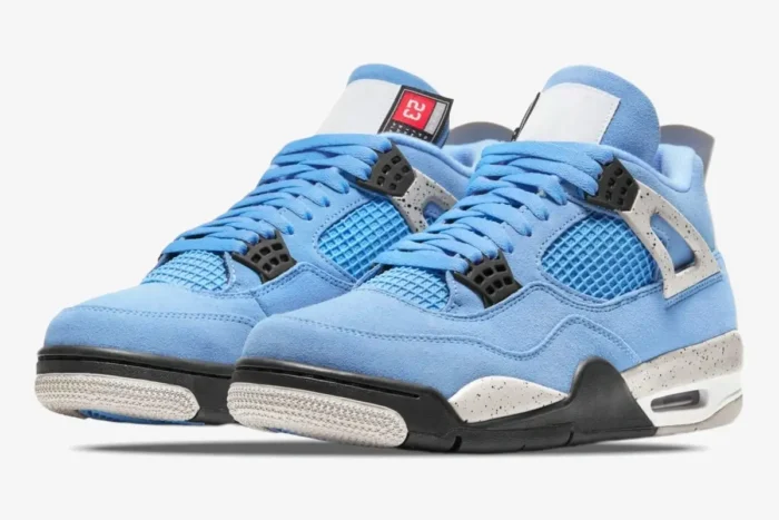 Air Jordan 4 Retro University Blue sneakers in a three-quarter front view against a white background. - SKU CT8527-400