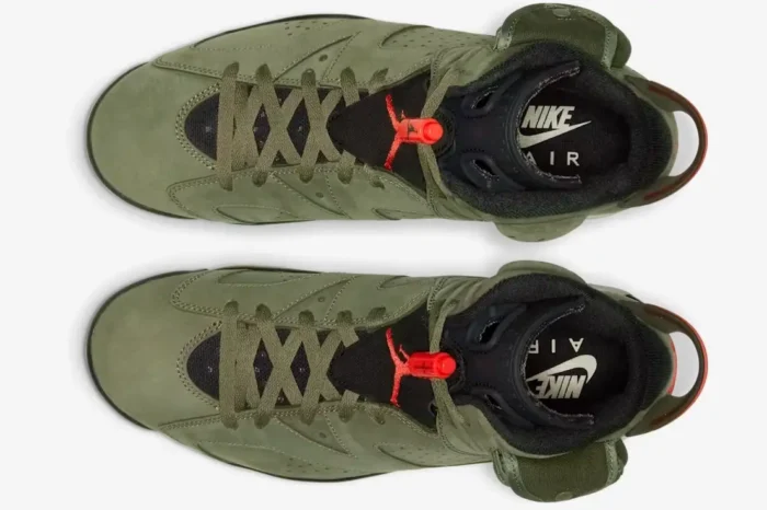 Top-down view of a pair of Air Jordan 6 Retro x Travis Scott sneakers in Medium Olive green with red lace locks. - SKU CN1084-200