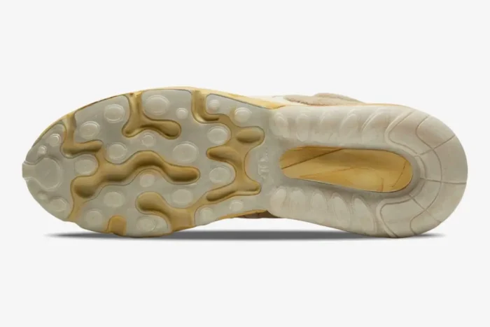 Bottom view of the Nike Air Max 270 React x Travis Scott Cactus Trails outsole in distressed cream and tan. - SKU DD8798-200