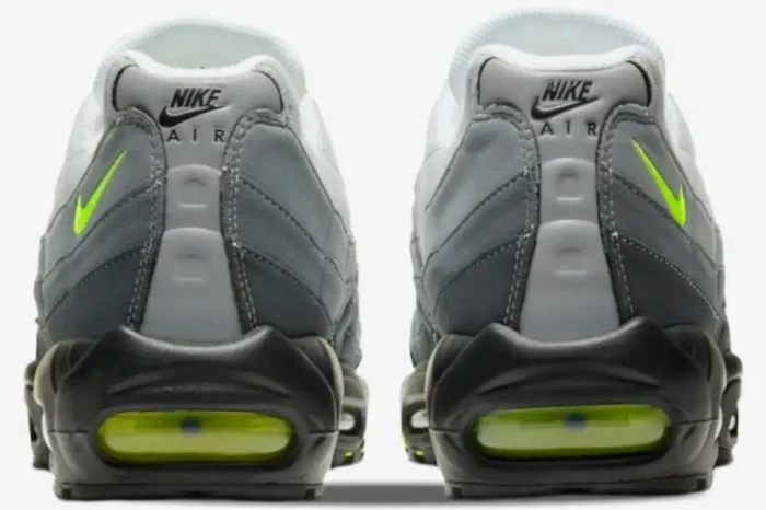 Rear view of Nike Air Max 95 OG Neon shoes in grey and black with neon yellow accents. - SKU 554970-071