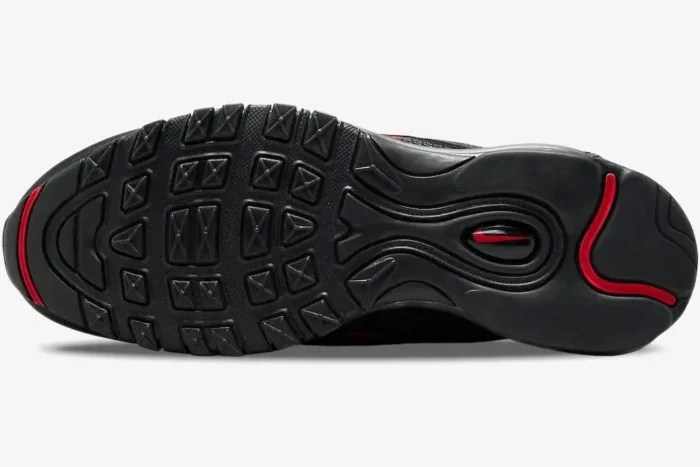 Bottom view of the black and red Nike Air Max 97 Satan Shoe custom outsole with tread pattern.