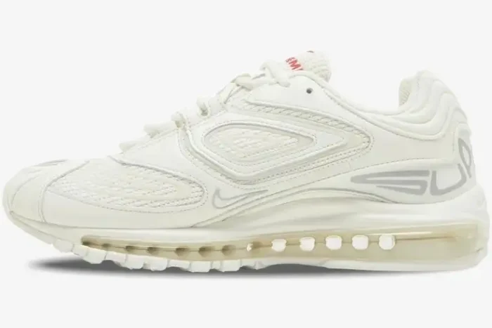 Side view of the Nike Air Max 98 TL x Supreme sneaker in a clean white and cream colorway. - SKU DR1033-100