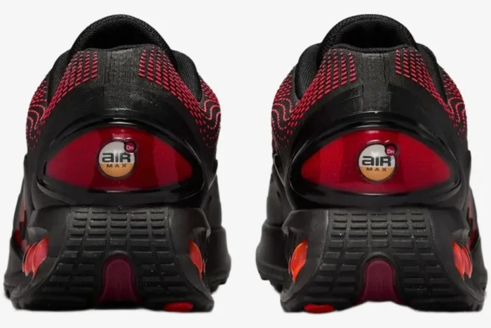 Rear view of Nike Air Max DN Bred sneakers in black and university red with heel logos. - SKU HV5235-002