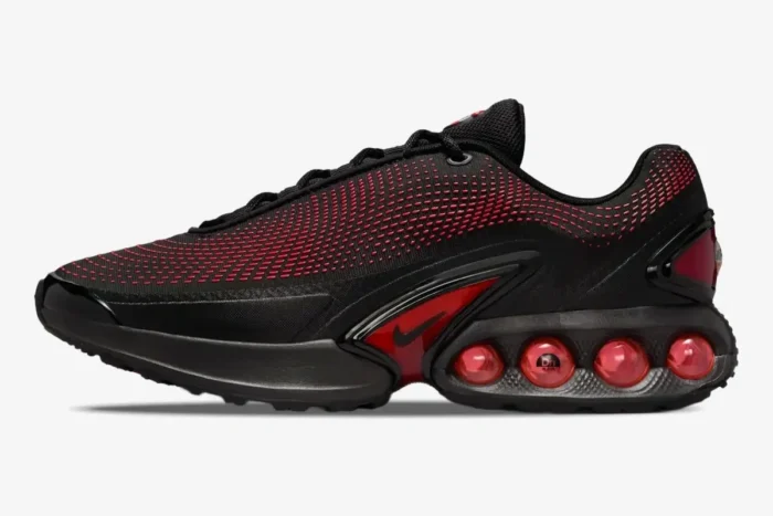 Side view of Nike Air Max DN Bred sneakers in black and university red with visible air units. - SKU HV5235-002