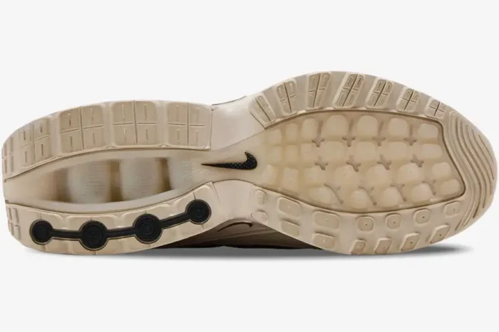 Outsole view of the Nike Air Max Dn in Smokey Purple Beige, showing traction pattern and black swoosh. - SKU HQ0912-200