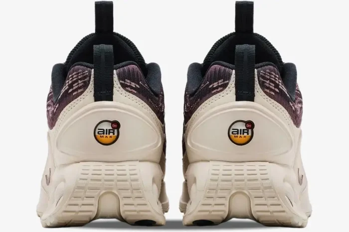 Rear view of Nike Air Max Dn 'Smokey' Purple Beige sneakers with circular Air Max branding on the heels. - SKU HQ0912-200