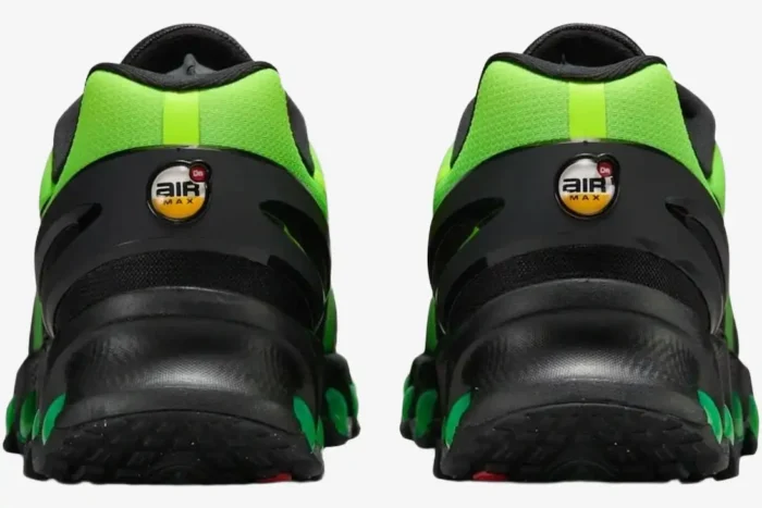 Rear view of Nike Air Max Dn8 sneakers in Black and Green Strike Volt with heel branding. - SKU HQ4681-010
