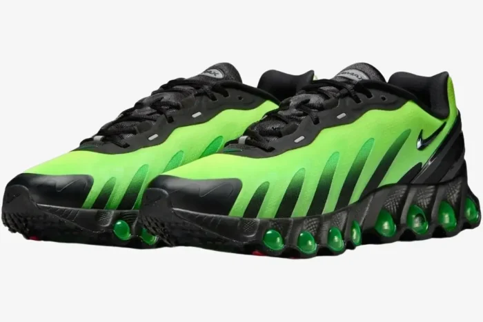Nike Air Max Dn8 sneakers in Black and Green Strike Volt, three-quarter side view. - SKU HQ4681-010
