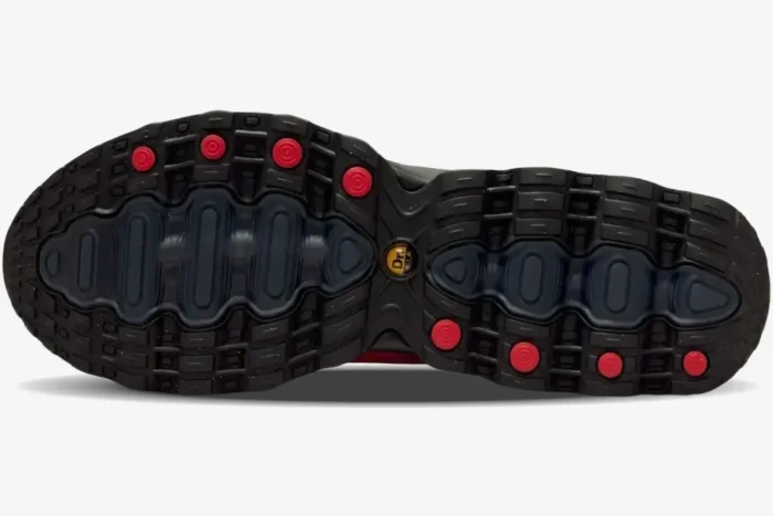 Bottom view of the Nike Air Max Dn8 Hyper Pink Black outsole showing black tread and red circular pods. - SKU FQ7860-600