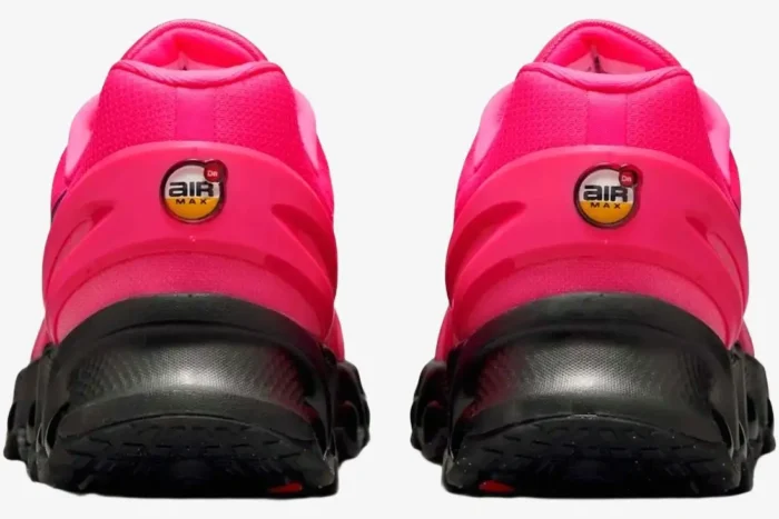 Rear view of Nike Air Max Dn8 sneakers in hyper pink and black, showing heel logos. - SKU FQ7860-600