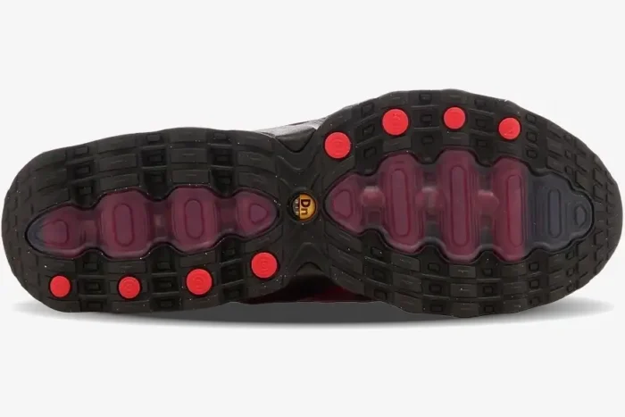 Bottom view of the Nike Air Max DN8 Red Black outsole featuring black rubber and red air units. - SKU FQ7860-008