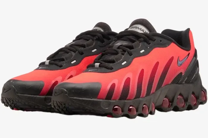 Nike Air Max DN8 sneakers in red and black, three-quarter front view showing gradient design and air units. - SKU FQ7860-008