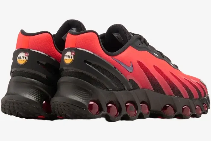 Rear view of Nike Air Max DN8 sneakers in red and black featuring a unique multi-bubble sole. - SKU FQ7860-008