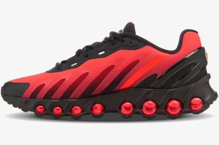 Nike Air Max DN8 sneakers in red and black, side profile view showing unique circular air units. - SKU FQ7860-008