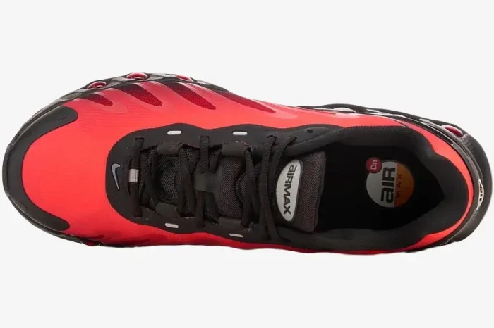 Top-down view of the Nike Air Max DN8 in red and black, showing the laces and insole branding. - SKU FQ7860-008