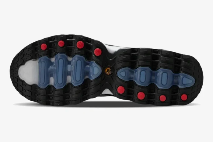 Bottom view of the Nike Air Max DN8 White Black showing the black outsole with blue air units and red accents. - SKU  FQ7860-100